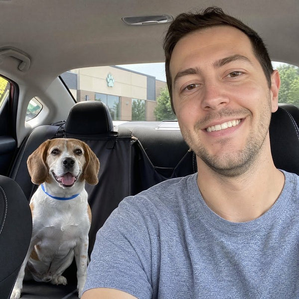 Brian L. from Austin, TX with their dog wearing a CollarZen collar and their dog wearing CollarZen